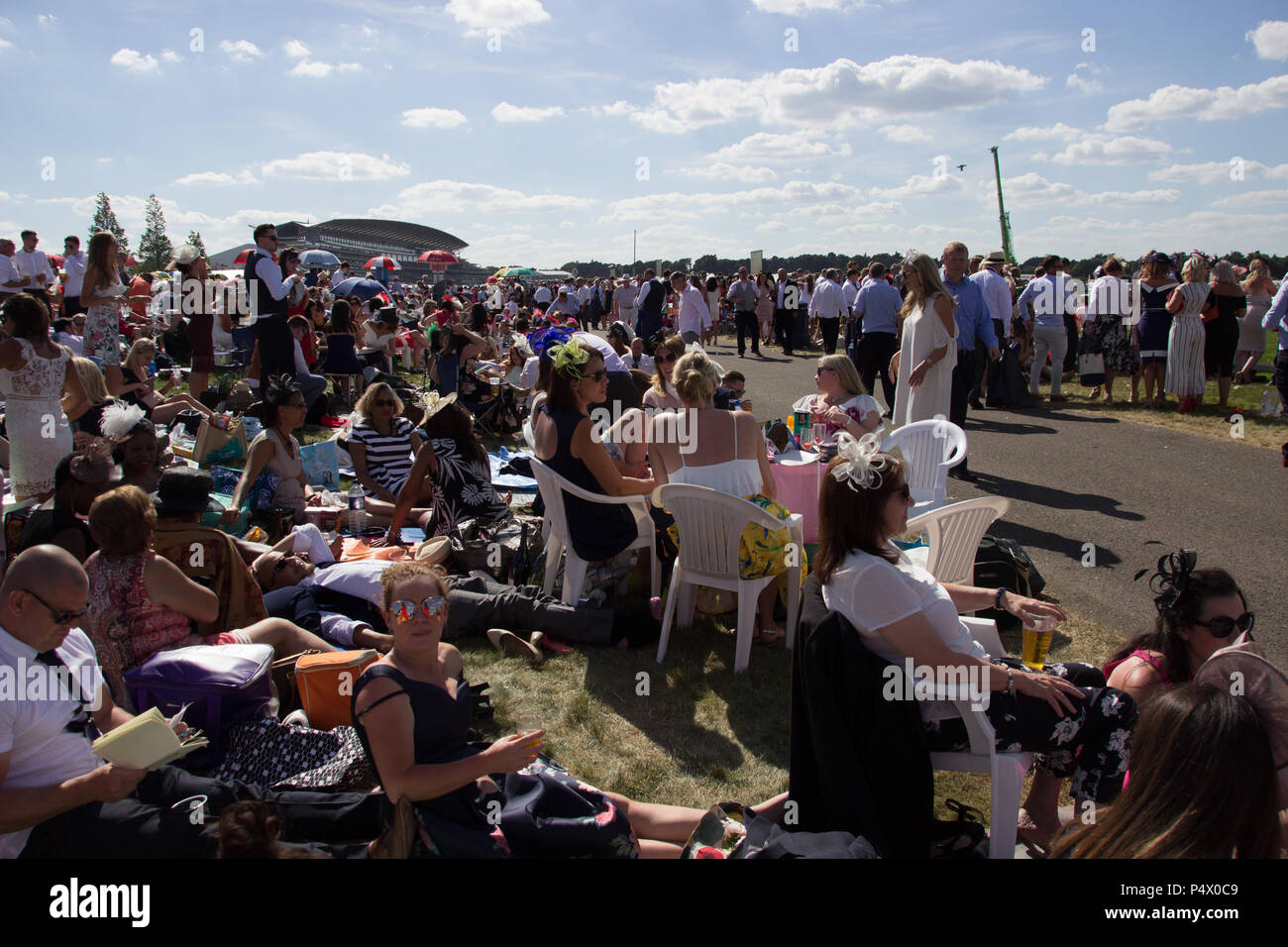 Large Crowds Of People Sitting On Grass In Windsor Enclosure At Royal large-crowds-of-people-sitting-on-grass-in-windsor-enclosure-at-royal