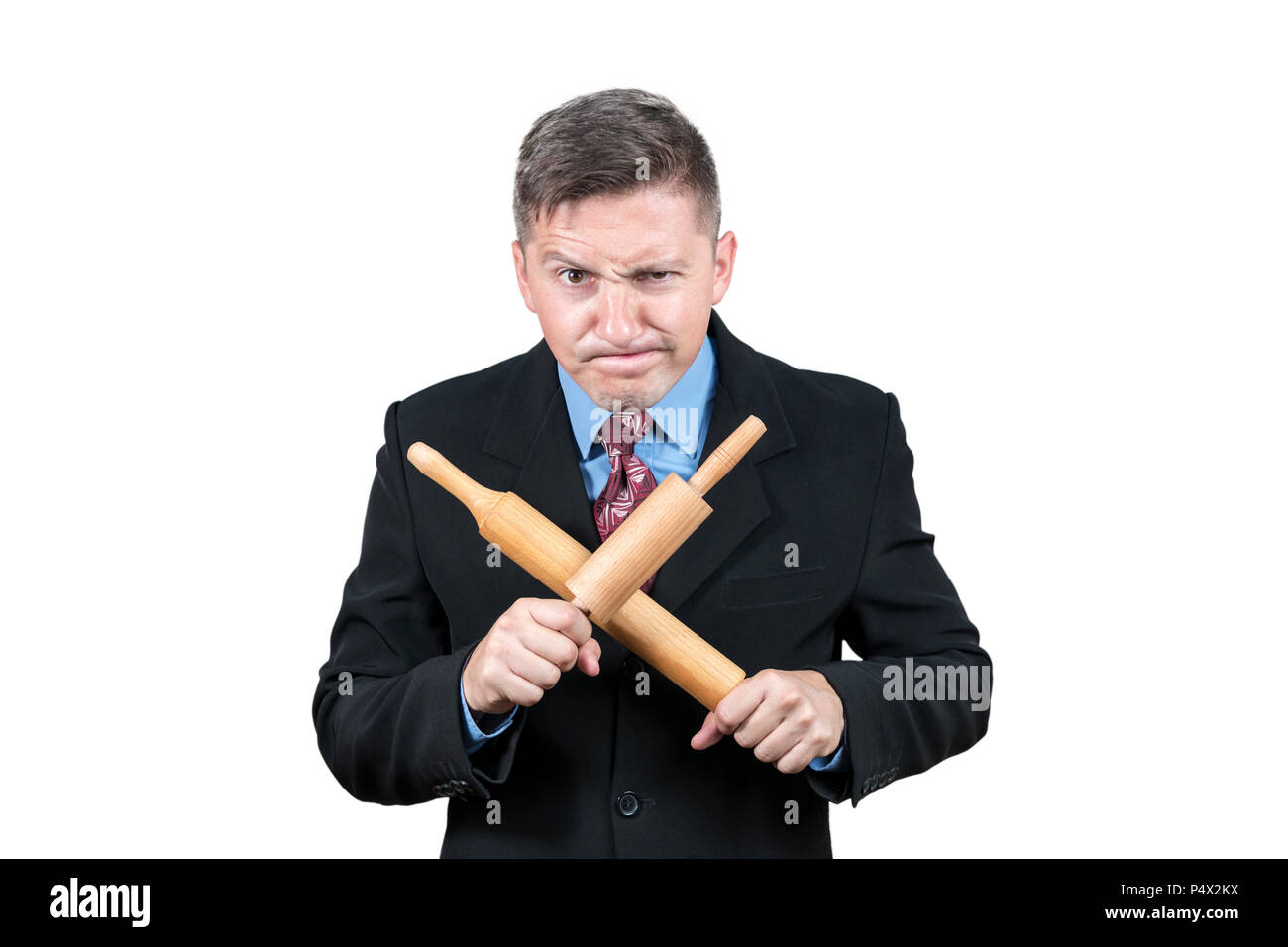 dissatisfied-businessman-with-two-crossed-rolling-pins-isolated-on-white-background-P4X2KX.jpg