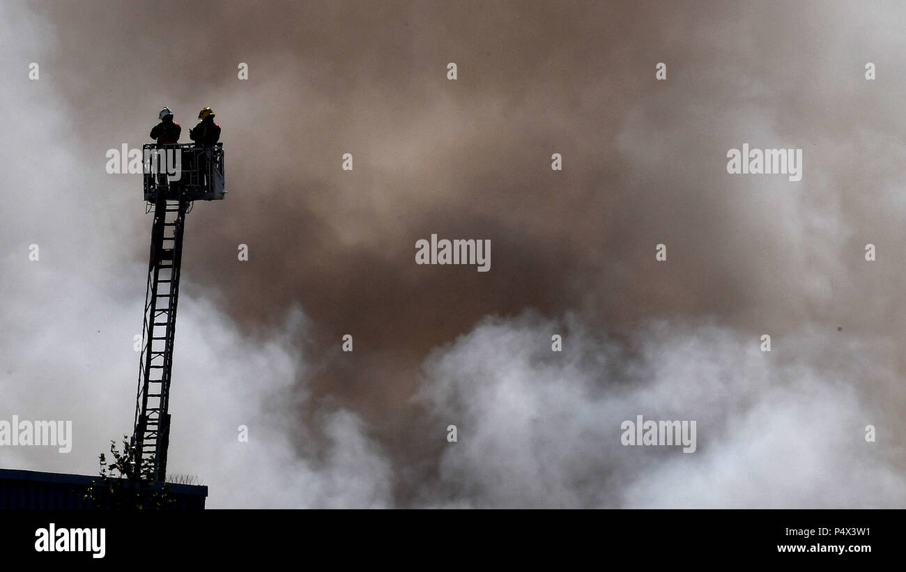 Firefighters at the scene of a large fire in a warehouse in Leyton ...