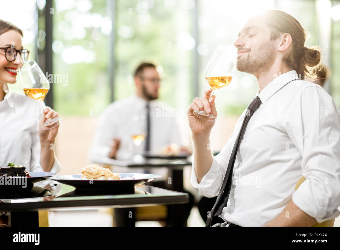 Business people during a lunch at the restaurant Stock Photo