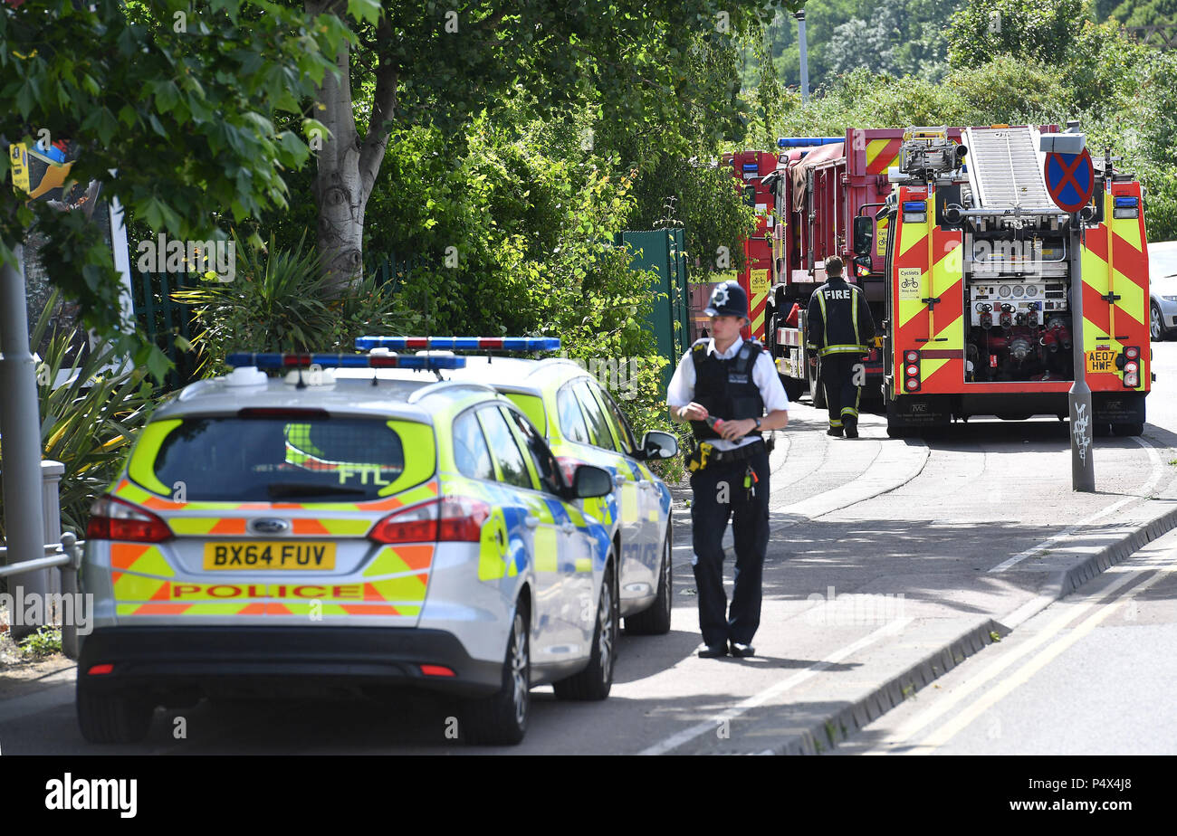 Emergency services at the scene of a large fire in a warehouse in ...