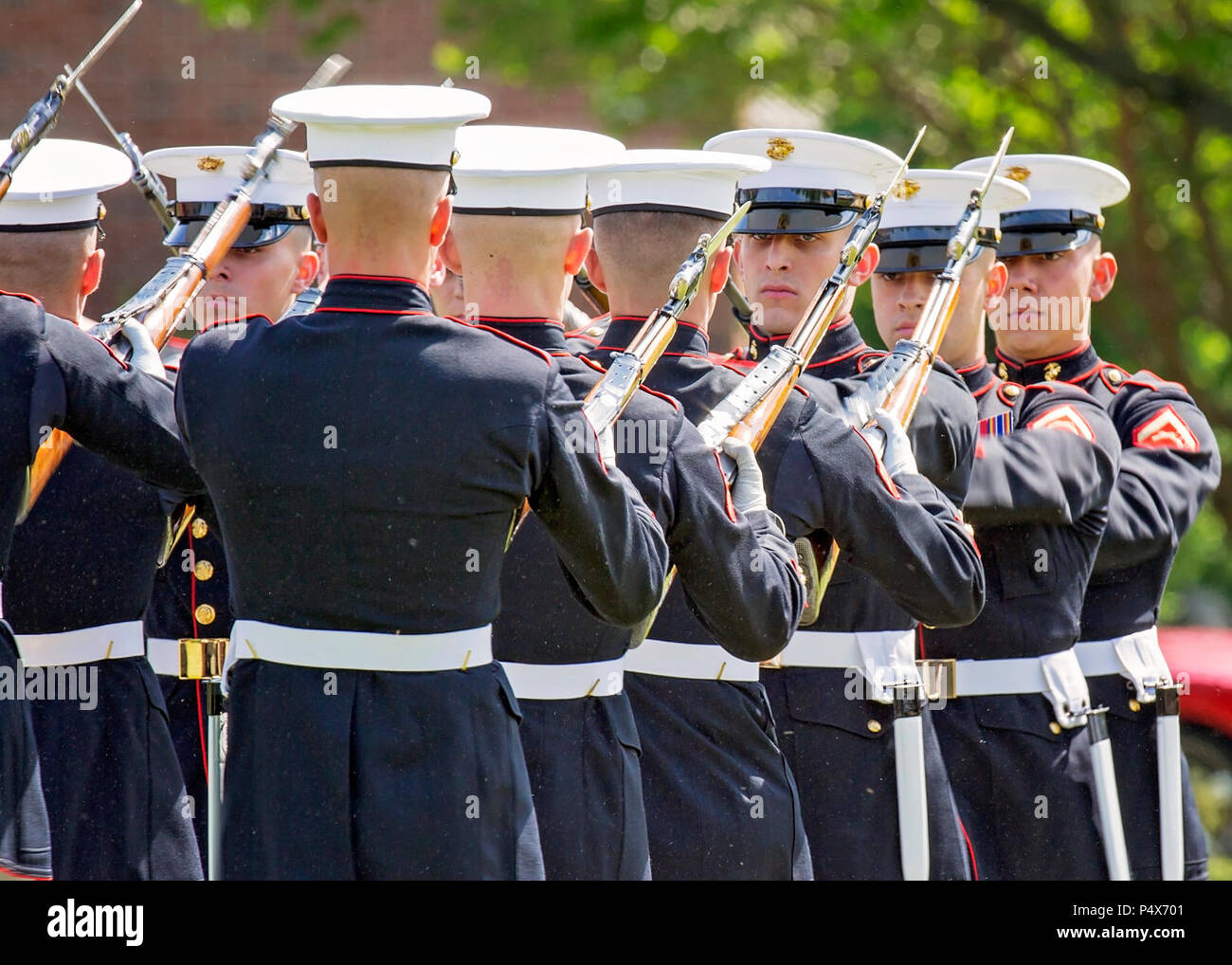 The U.S. Marine Corps Silent Drill Platoon performs during the Centennial Celebration Ceremony at Lejeune Field, Marine Corps Base (MCB) Quantico, Va., May 10, 2017. The event commemorates the founding of MCB Quantico in 1917, and consisted of performances by the U.S. Marine Corps Silent Drill Platoon and the U.S. Marine Drum & Bugle Corps. Stock Photo