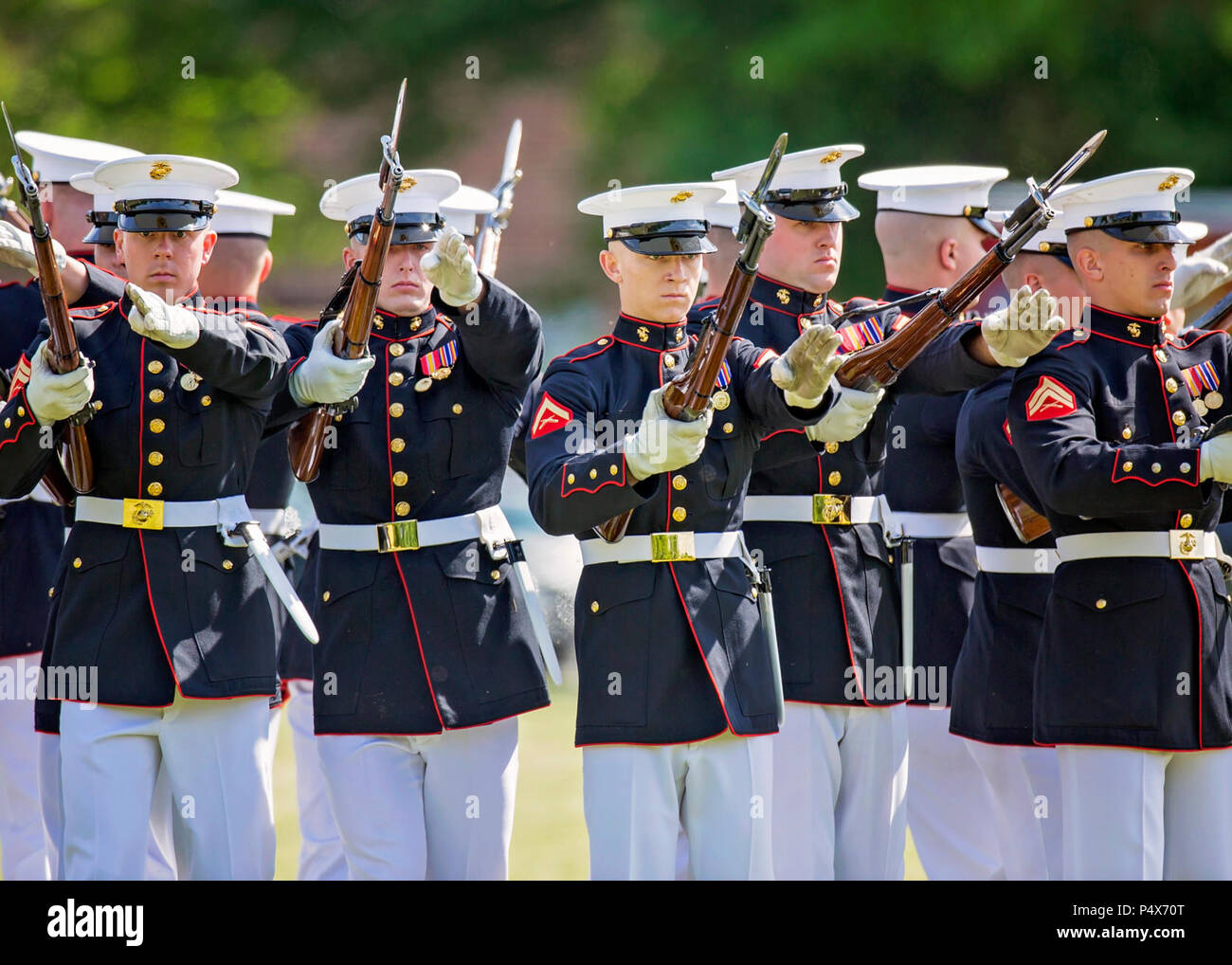 The U.S. Marine Corps Silent Drill Platoon performs during the Centennial Celebration Ceremony at Lejeune Field, Marine Corps Base (MCB) Quantico, Va., May 10, 2017. The event commemorates the founding of MCB Quantico in 1917, and consisted of performances by the U.S. Marine Corps Silent Drill Platoon and the U.S. Marine Drum & Bugle Corps. Stock Photo