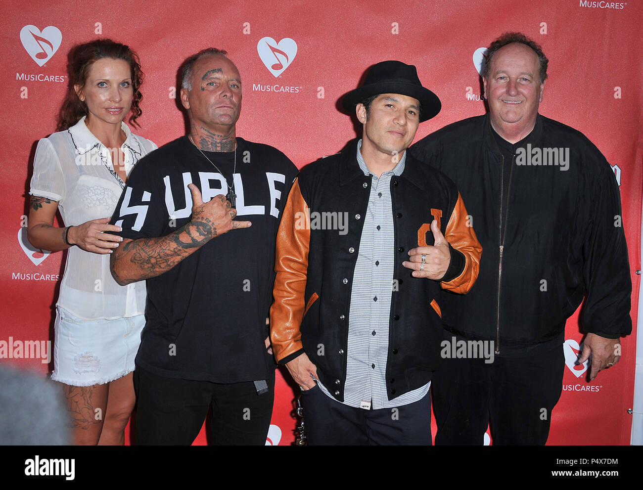 Jay Adams, Christian Hosoi, Steve Van Doren arriving at Musicares Benefit at the Club Nokia in Los Angeles.Jay Adams, Christian Hosoi, Steve Van Doren  Event in Hollywood Life - California, Red Carpet Event, USA, Film Industry, Celebrities, Photography, Bestof, Arts Culture and Entertainment, Topix Celebrities fashion, Best of, Hollywood Life, Event in Hollywood Life - California, Red Carpet and backstage, movie celebrities, TV celebrities, Music celebrities, Topix, actors from the same movie, cast and co star together.  inquiry tsuni@Gamma-USA.com, Credit Tsuni / USA, 2013 - Group, TV and mov Stock Photo