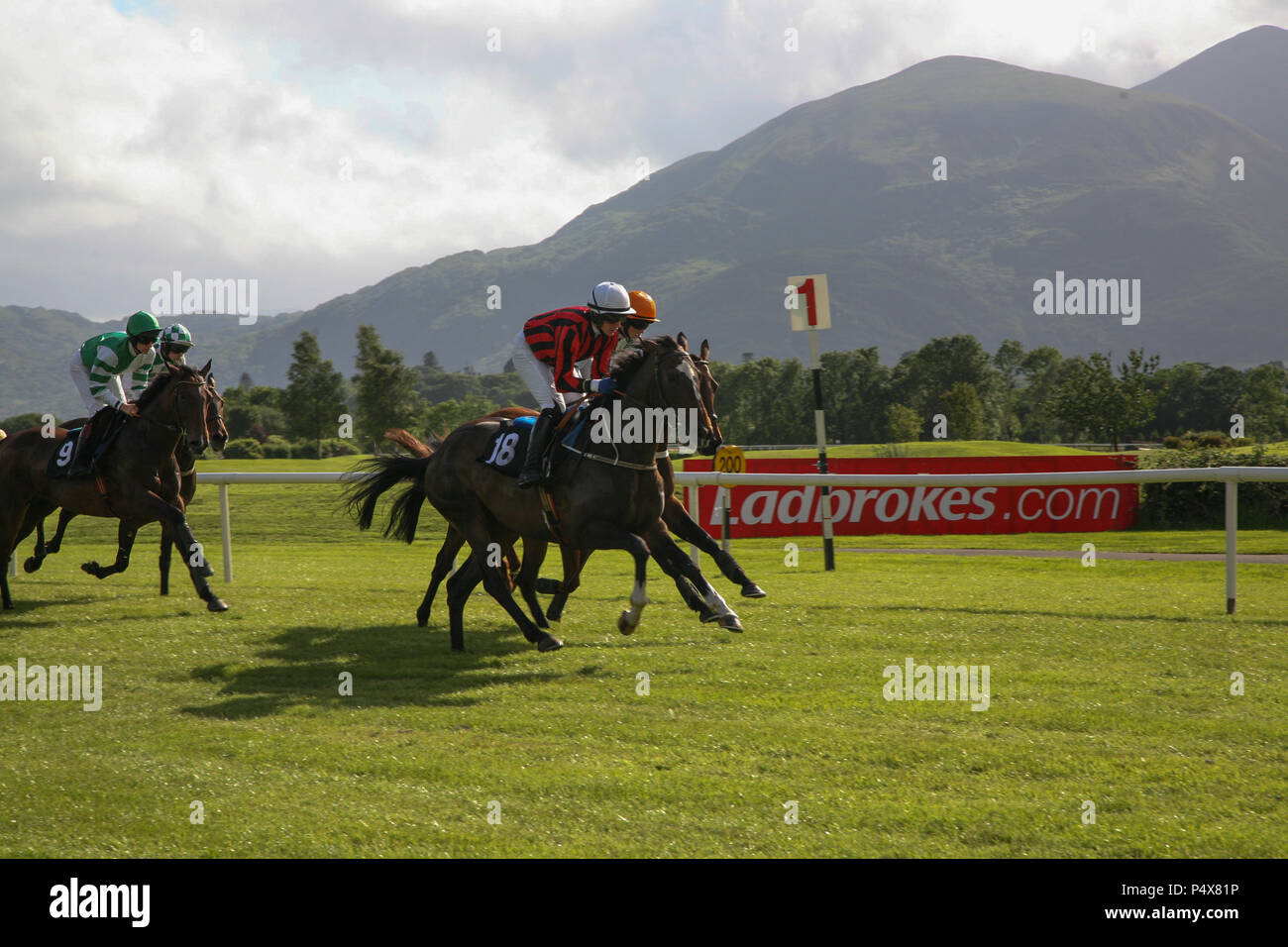 Killarney Horse Race, two horses neck to neck to the final post