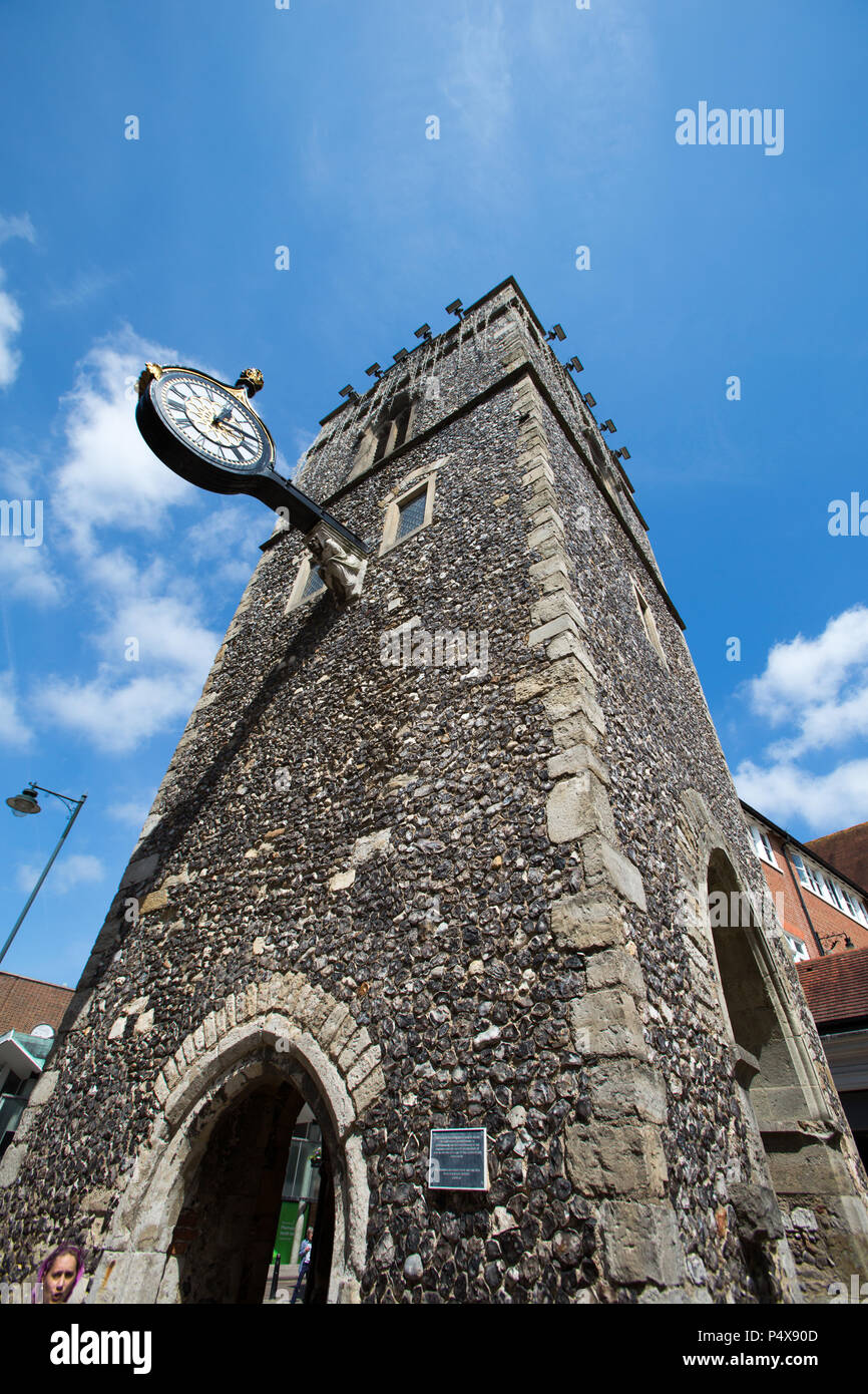 City of Canterbury, England. Picturesque view of the St George’s Tower and clock, on Caterbury’s St George’s Street. Stock Photo