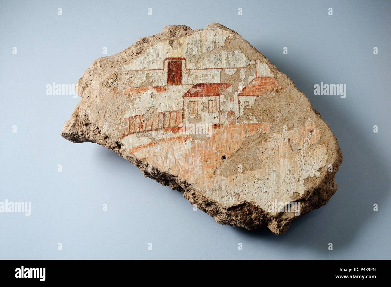 Piece of mural painting on dry sand and lime mortar with figurative decoration. 32 cm x 27 cm - Medieval period belonging of the ' Burgo de Santiuste Museum' in Alcalá de Henares. (Madrid ). SPAIN. Stock Photo