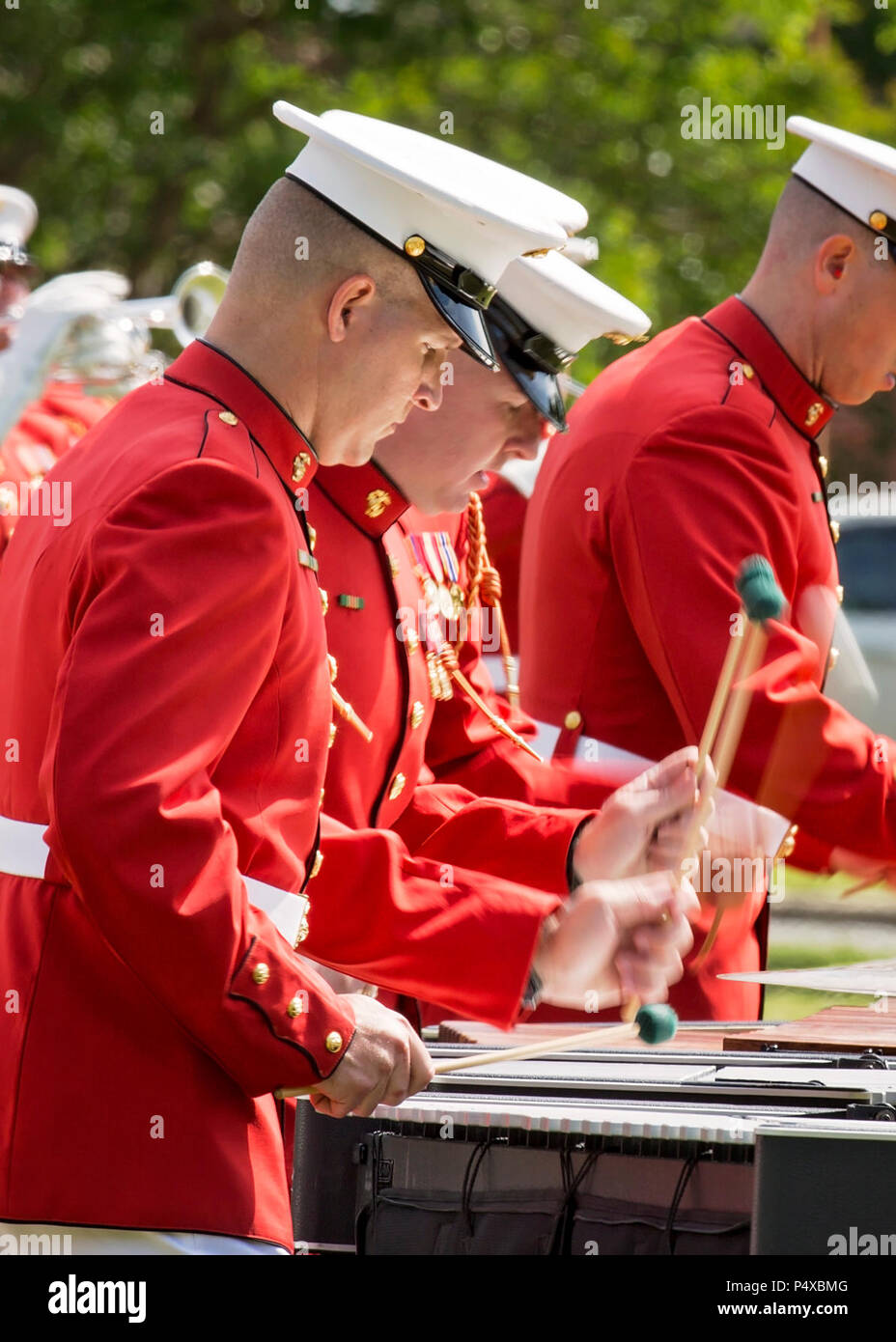 Members of the U.S. Marine Drum & Bugle Corps perform during the Centennial Celebration Ceremony at Lejeune Field, Marine Corps Base (MCB) Quantico, Va., May 10, 2017. The event commemorates the founding of MCB Quantico in 1917, and consisted of performances by the U.S. Marine Corps Silent Drill Platoon and the U.S. Marine Drum & Bugle Corps. Stock Photo