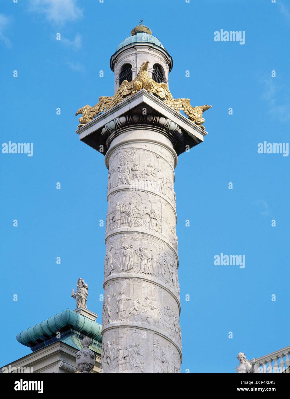 Baroque Art. Karlskirche or Church of St. Charles Borromeo (1716-1737). Column on the left side of the church, decorated with spirals and depicting scenes from the life of St. Charles Borromeo. Vienna. Austria. Stock Photo