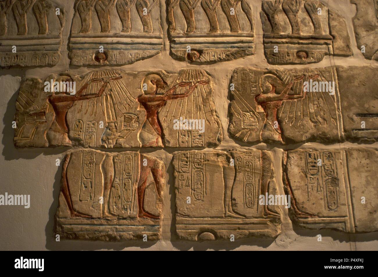 Egyptian art. Talatat walls from the temple of Amenhotep IV. Composed of 283 blocks of polychromed sandstone. Ritual to the sun god Amun. 18th Dynasty. New Empire. Luxor Museum. Egypt. Stock Photo