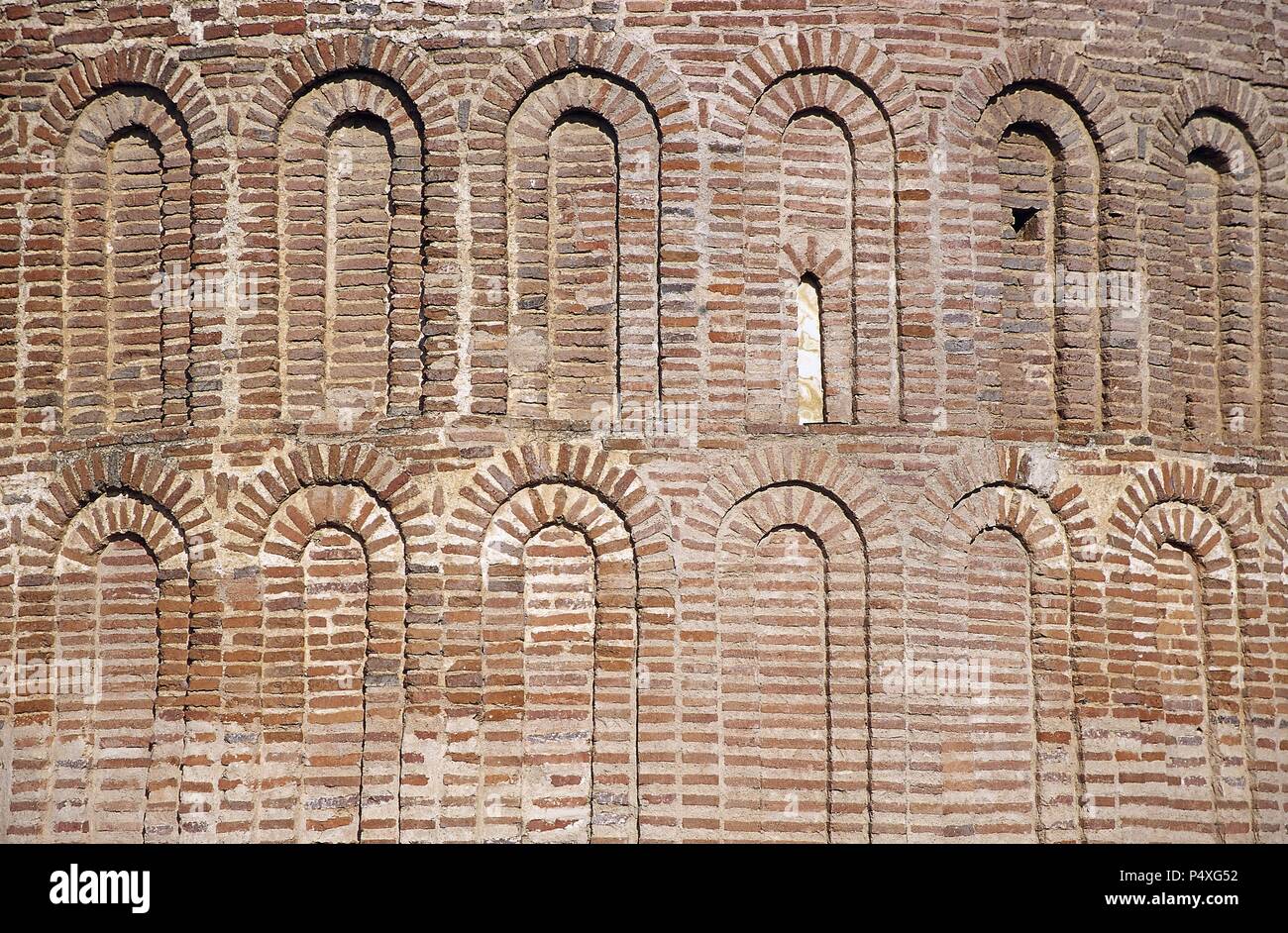 Church of the Assumption of our Lady. Detail of the apse. Mudejar Romanesque style built in the thirteenth century. Cubillo de Uceda. Guadalajara province. Castile-La Mancha. Spain. Stock Photo