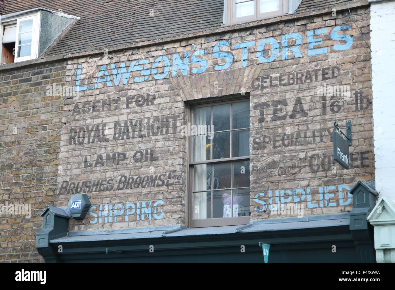 Old shop advert uncovered , Whitstable , Kent Stock Photo