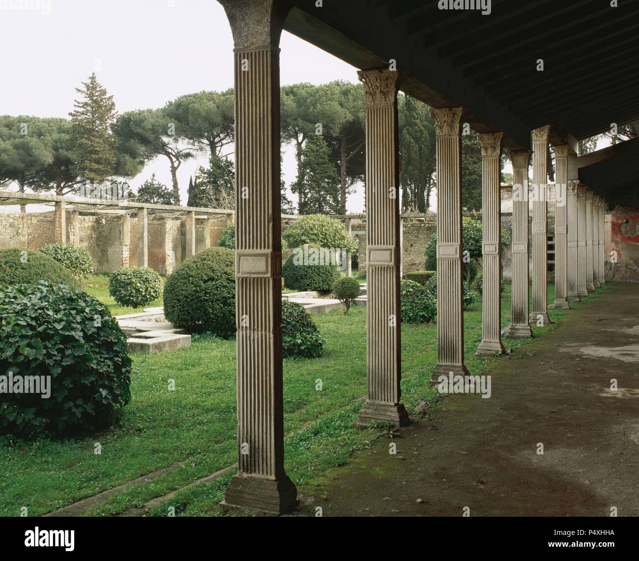 Italy. Pompeii.1st century AD. House of Julia. Garden   surrounded by original marble-embellished quadrangular columns. Stock Photo