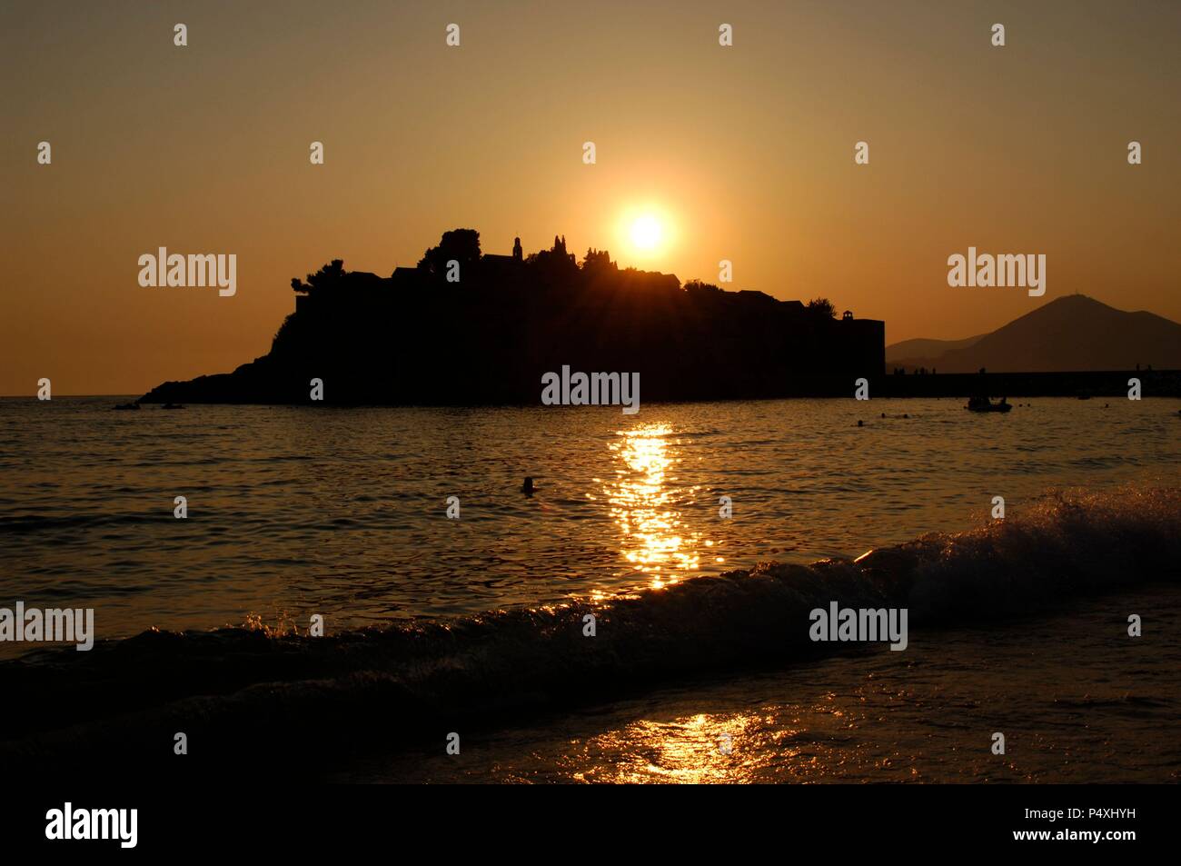 Sunset on the island of Sveti Stefan. Republic of Montenegro. Stock Photo