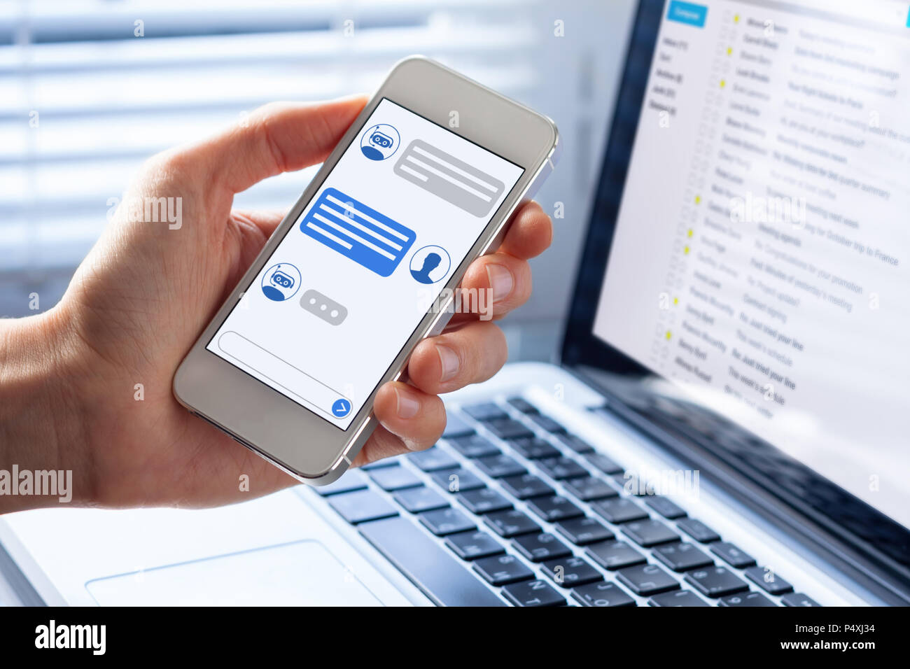 Chatbot conversation on smartphone screen app interface with artificial intelligence technology providing virtual assistant customer support and infor Stock Photo