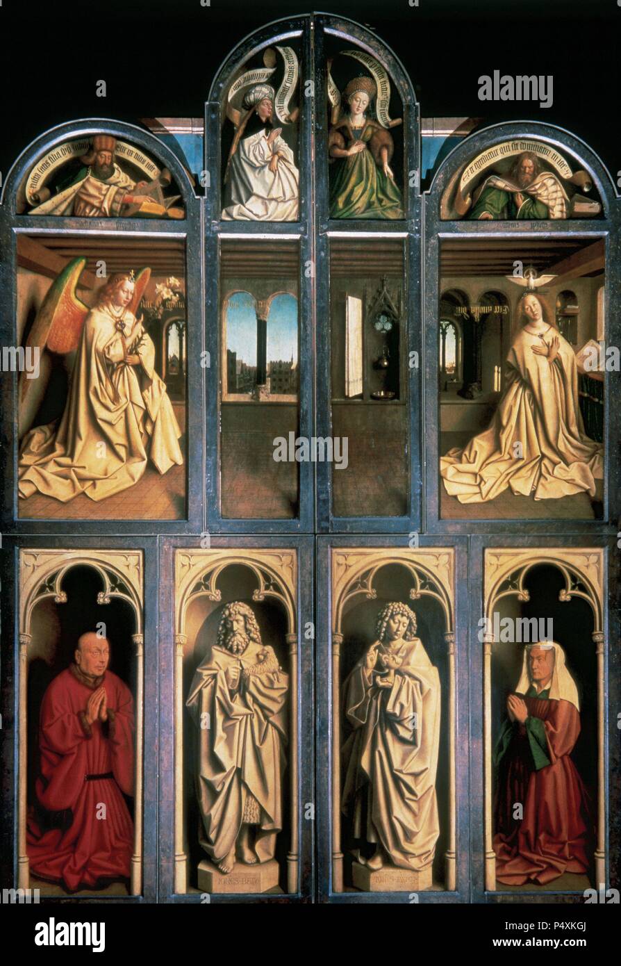 Gothic Art. Belgium. 15th Century. The Ghent Altarpiece, also known as The Adoration of the Mystic Lamb or The Lamb of God. Early Flemish polyptych panel painting. Commisioned from Hubert van Eyck (1385/90-1426) and executed by his brother Jan van Eyck (c.1390-c.1441), 1430-32. Closed view. Prophets, Sibyls, an annunciation scene, donors and Saints. Oil on oak. Saint Bavo Cathedral. Ghent. Stock Photo