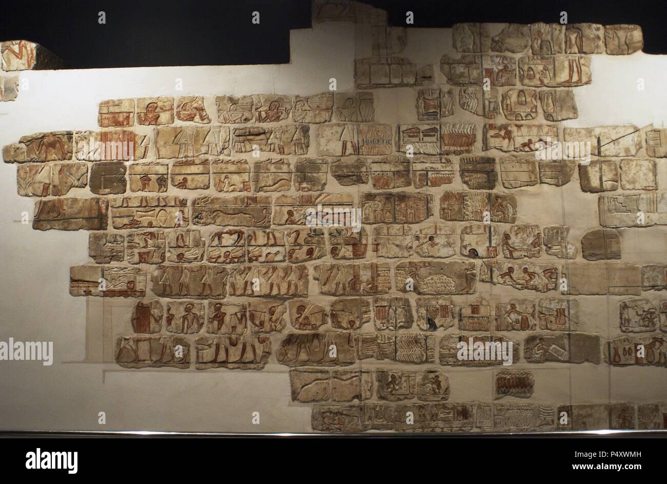 Egyptian art. Talatat walls from the temple of Amenhotep IV. Composed of 283 blocks of polychromed sandstone.18th Dynasty. New Empire. Luxor Museum. Egypt. Stock Photo