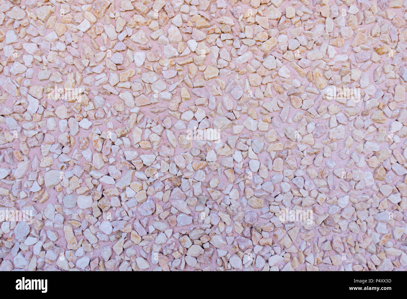 Small stone wall texture background Stock Photo - Alamy