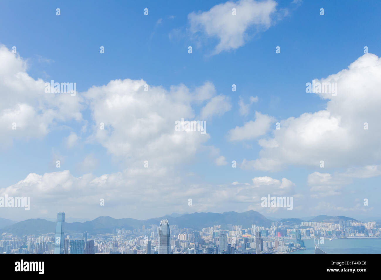 Modern highrise modern buildings with blue sky in the city at Victoria's Peak, Hong Kong Stock Photo