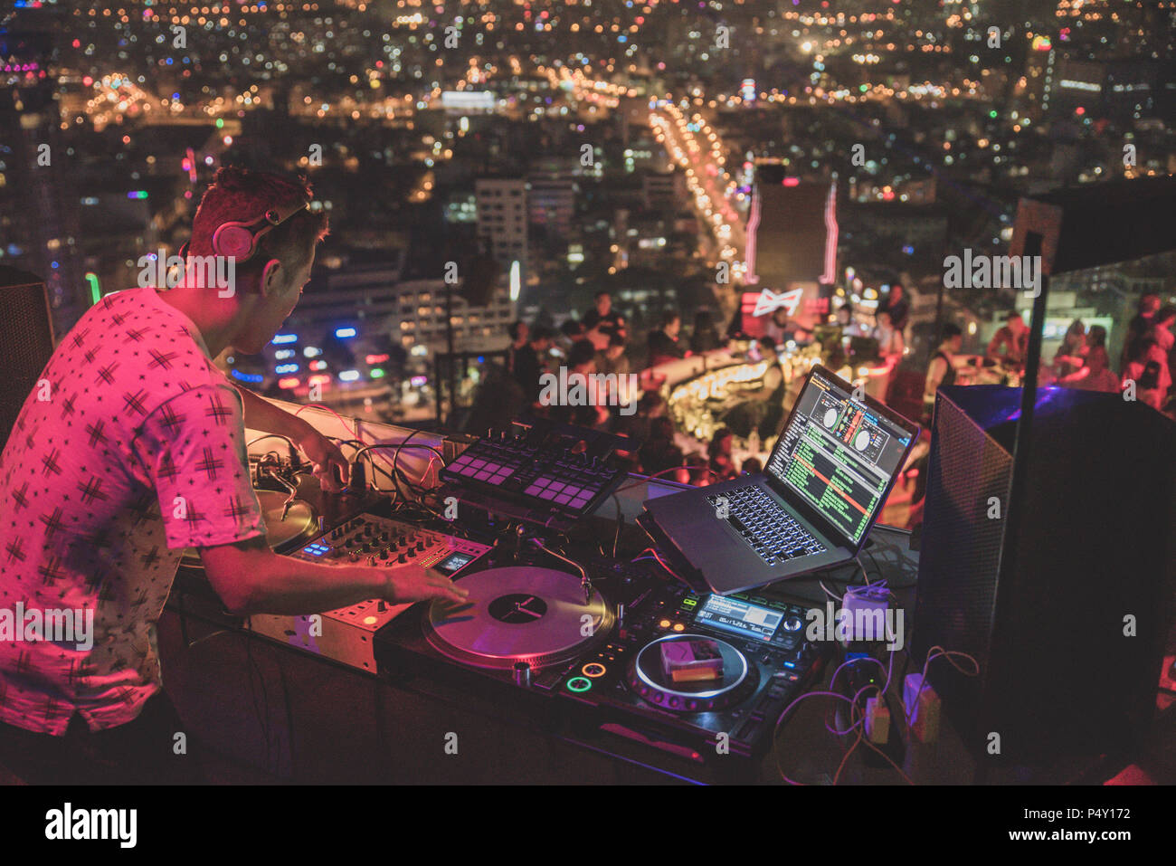 DJ - Party on top of building with music entertainment Stock Photo - Alamy