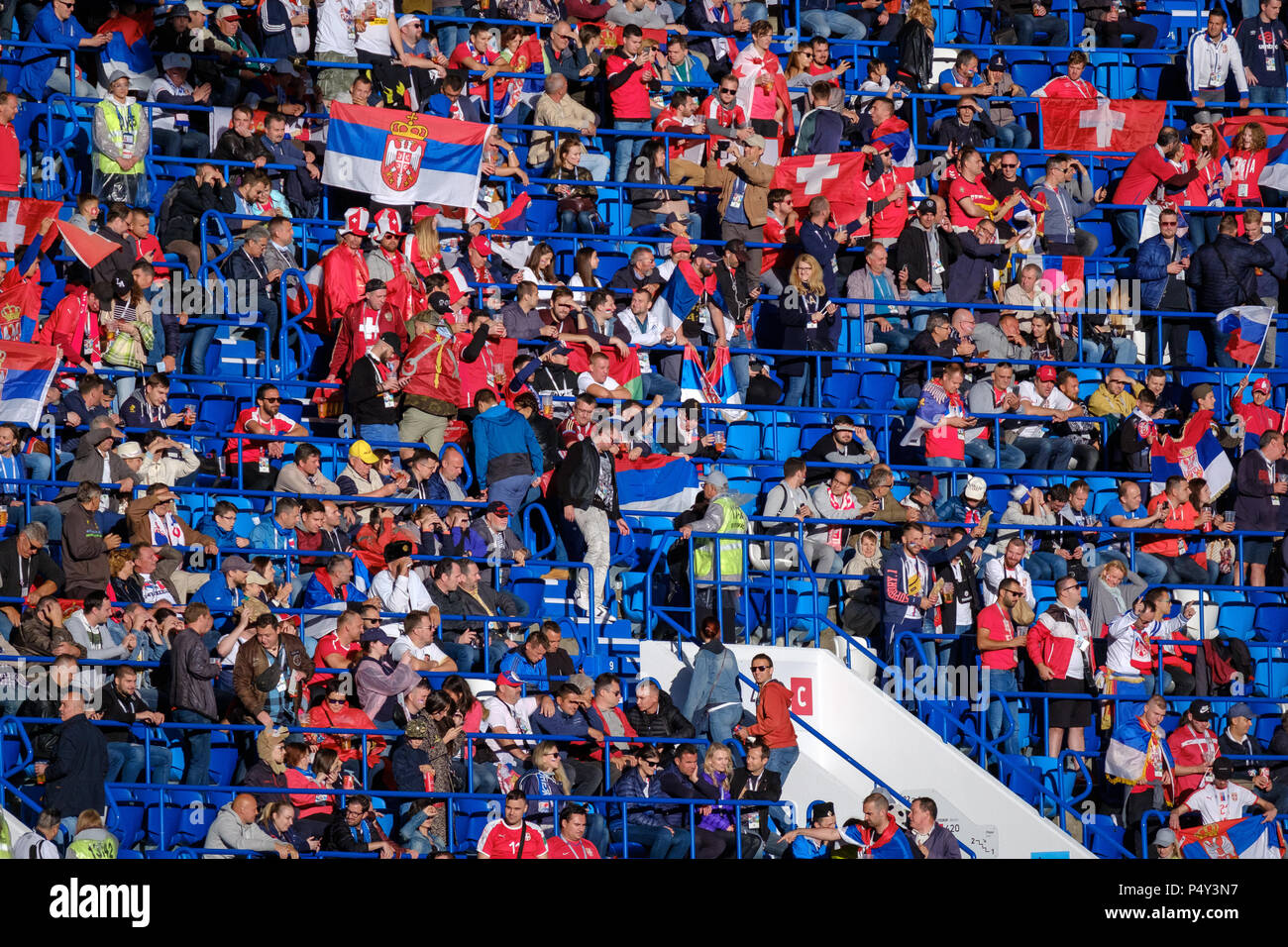Football fans support teams on the match between Serbia and Switzerland ...