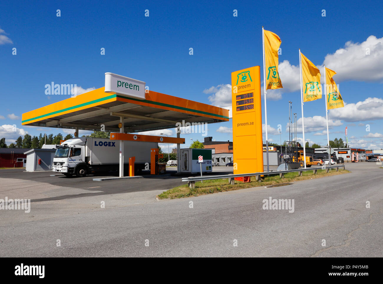 Skelleftea, Sweden - June 21, 2018: Preem brand gasoline service station along the high-way road number E4 with one diesel driven truck refuiling. Stock Photo