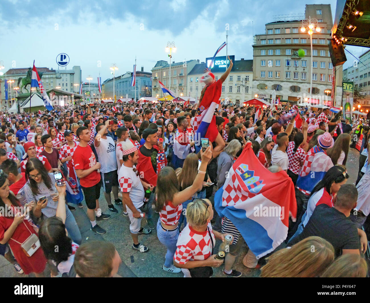 ZAGREB, CROATIA - JUNE 21 Croatian football fans on the Ban Jelacic Square, watching 2018 FIFA WORLD CUP RUSSIA match Argentina vs Croatia on June 21, Stock Photo