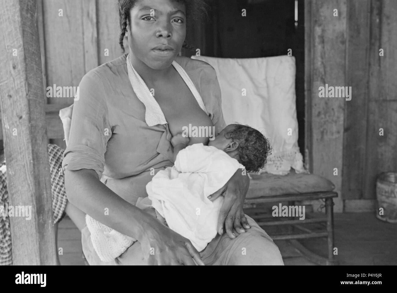 Sharecropper's Wife Breastfeeding Child, Little Rock, Arkansas, USA, Ben Shahn for U.S. Resettlement Administration, October 1935 Stock Photo