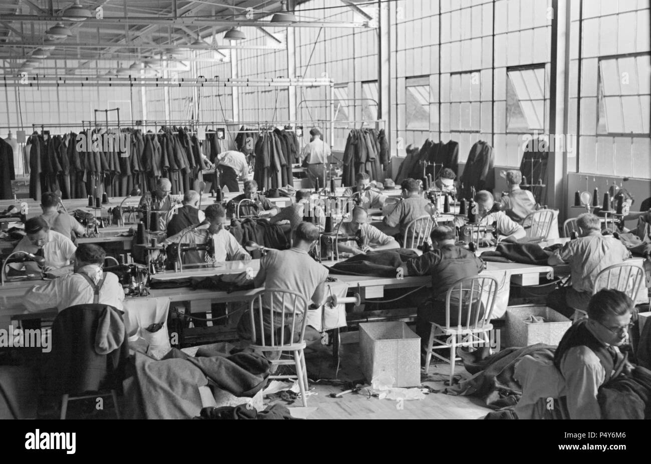 Interior View of Homesteaders Working at Cooperative Garment Factory at Jersey Homesteads, Hightstown, New Jersey, USA, Russell Lee, U.S. Resettlement Administration, November 1936 Stock Photo