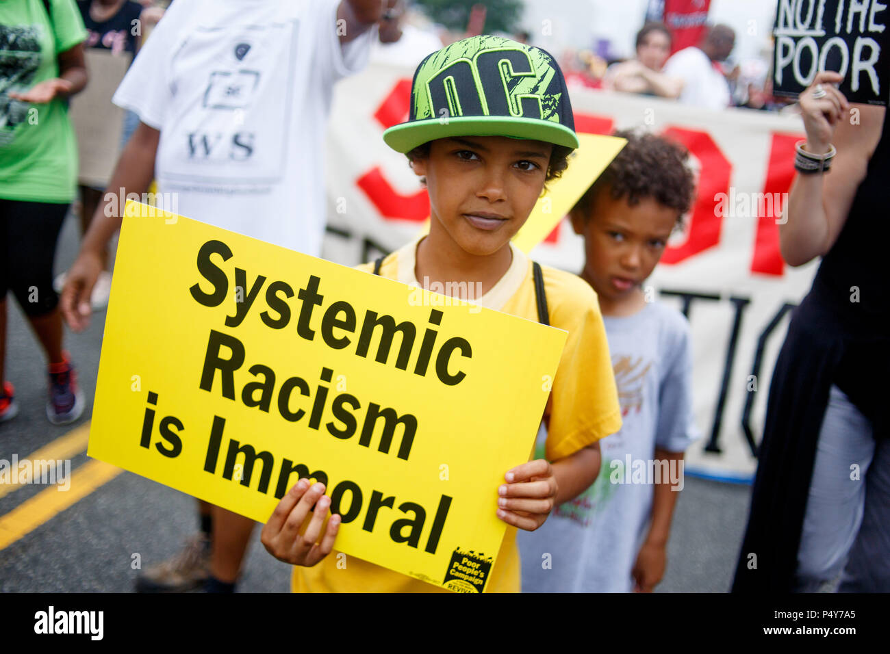 Washington, USA. 23rd June, 2018. Protestors walk toward the U.S. Capitol as part of the Stand Aganst Poverty March. The event is organized by the Poor People's Campaign, led by Rev. William Barber and Rev. Liz Theoharis and reviving a mission led by Dr. Martin Luther King, Jr. Credit: Michael Candelori/Pacific Press/Alamy Live News Stock Photo