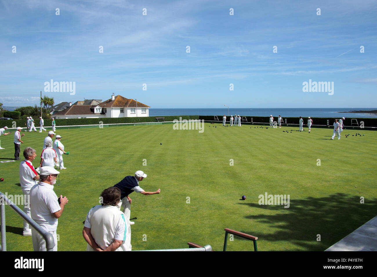 people playing bowls at Looe bowling club in Looe Cornwall UK Stock Photo