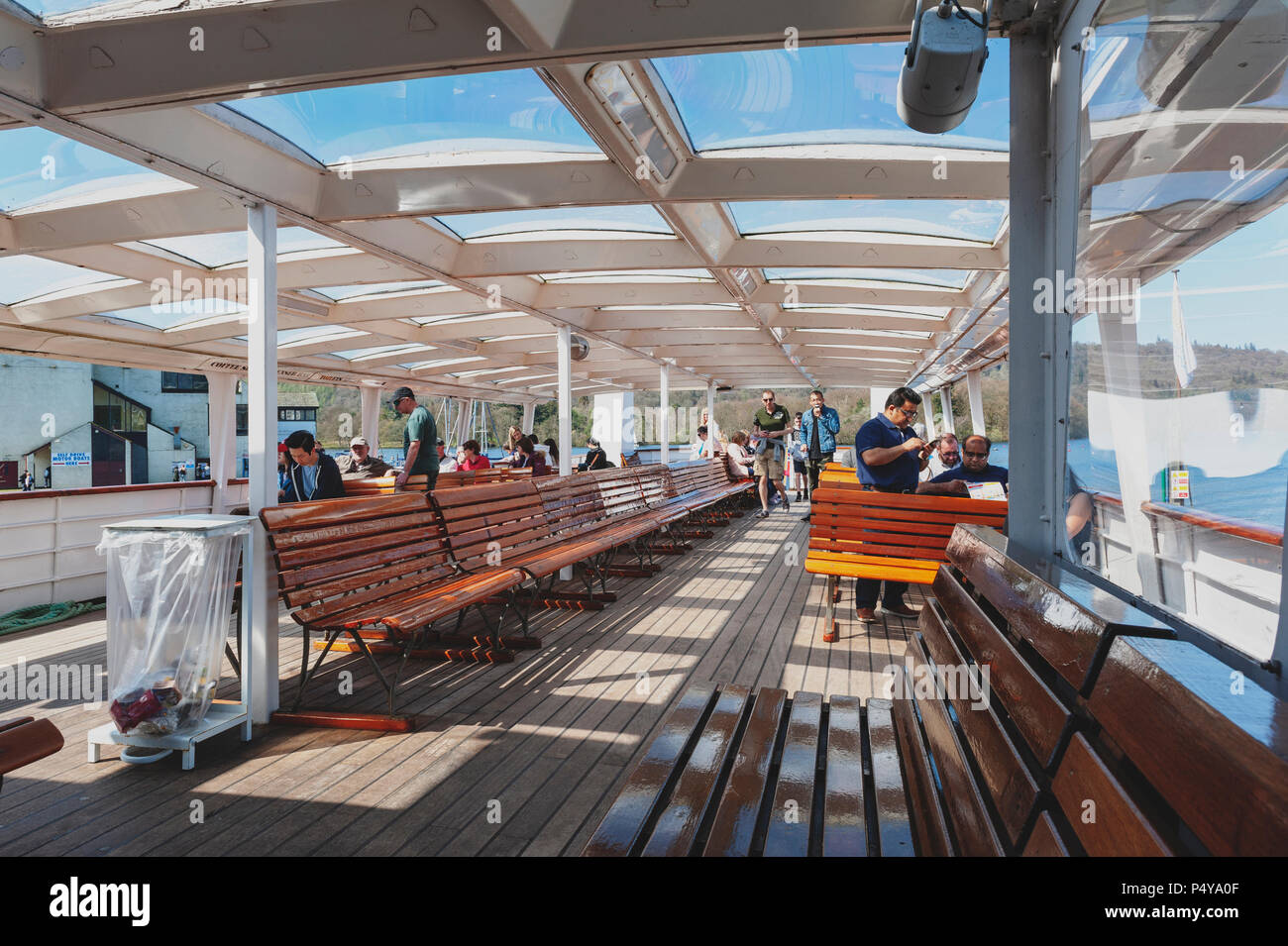 Tourists enjoying boat cruise at Lake Windermere from Bownesson