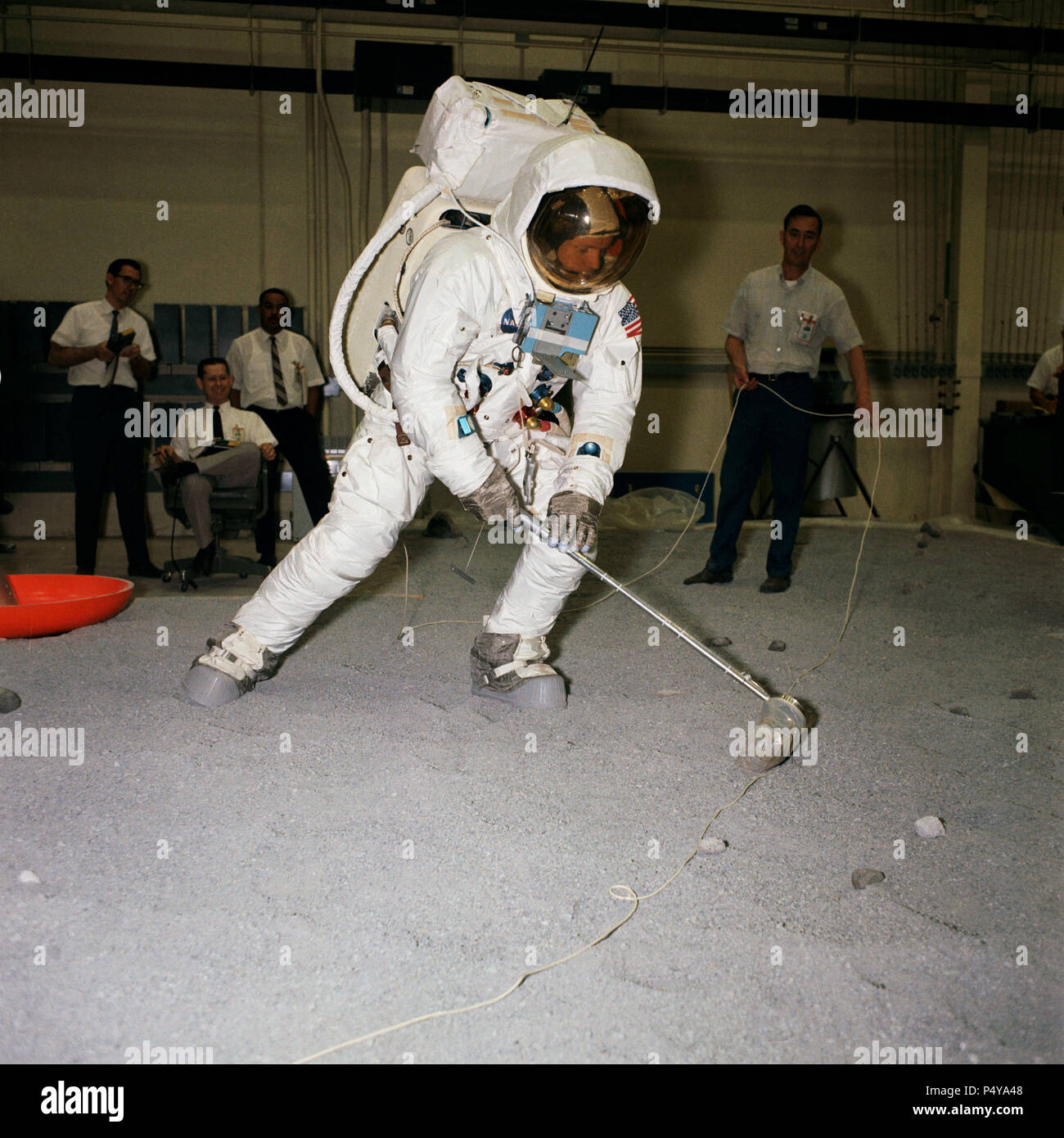 Suited astronaut Neil A. Armstrong, wearing an Extravehicular Mobility Unit (EMU), participates in lunar surface simulation training on April 18, 1969 Stock Photo