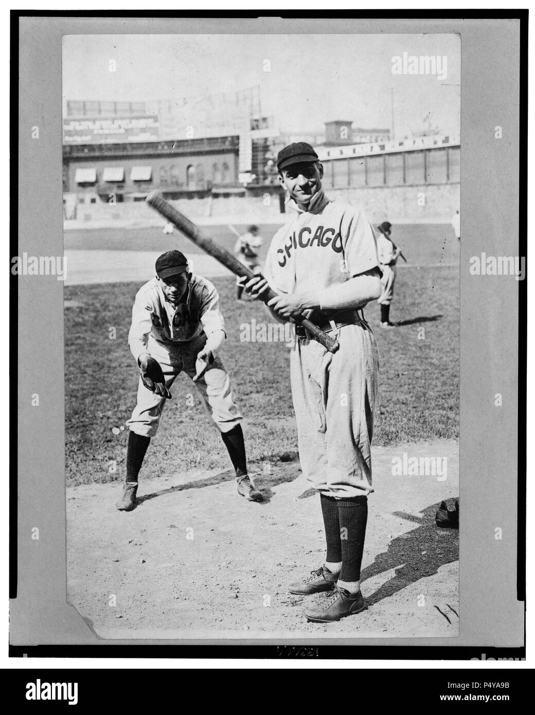 Arthur Solly Hofman batting and Jack Pfiester, a pitcher playing catcher, Chicago NL, (baseball) 1907 Stock Photo
