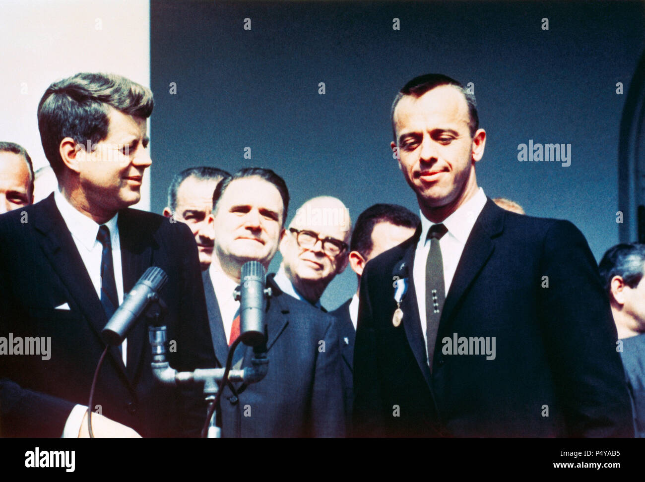 (8 May 1961) --- President John F. Kennedy (left) congratulates NASA's Distinguished Service Medal Award recipient astronaut Alan B. Shepard Jr. in a Rose Garden ceremony on May 8, 1961, at the White House. Stock Photo