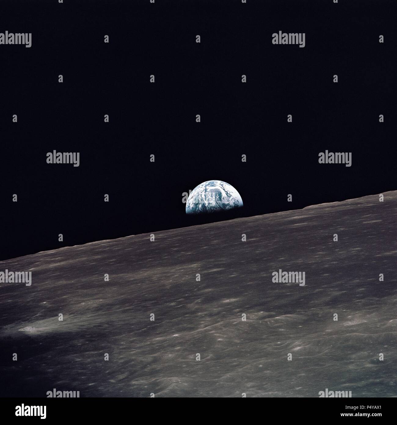 earth rising over the moon's horizon Stock Photo