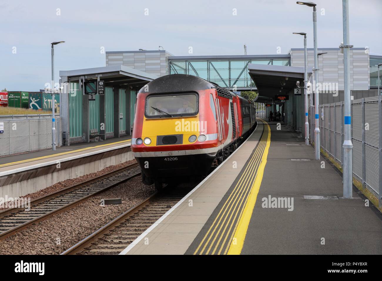 Edinburgh, UK. 23rd March 2018.  A Virgin Trains East Coast Service thunders through Edinburgh Gateway station bound for Aberdeen. This HST 43206 is one of the last services to run on the East Coast mainline before the franchise is taken over officially by LNER on 23rd June 2018. Due to operational difficulties the government has taken back control of this rail franchise which was operated by Stagecoach and Virgin. © Garry Cornes / Alamy Live News Stock Photo