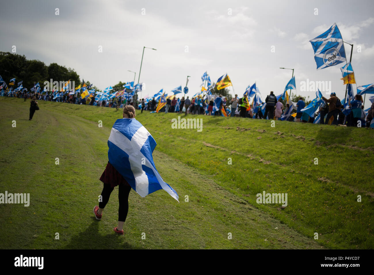 Stirling, Scotland, UK. 23rd June 2018.  Pro-Scottish Independence march, organised in the 'All Under One Banner' name, through the streets and to the battlefield in Bannockburn on the 704th anniverary of the Battle of Bannockburn. It was estimated that 10,000 people took part in the march calling for a second independence referendum. Photo credit Jeremy Sutton-Hibbert/Alamy Live News. Stock Photo