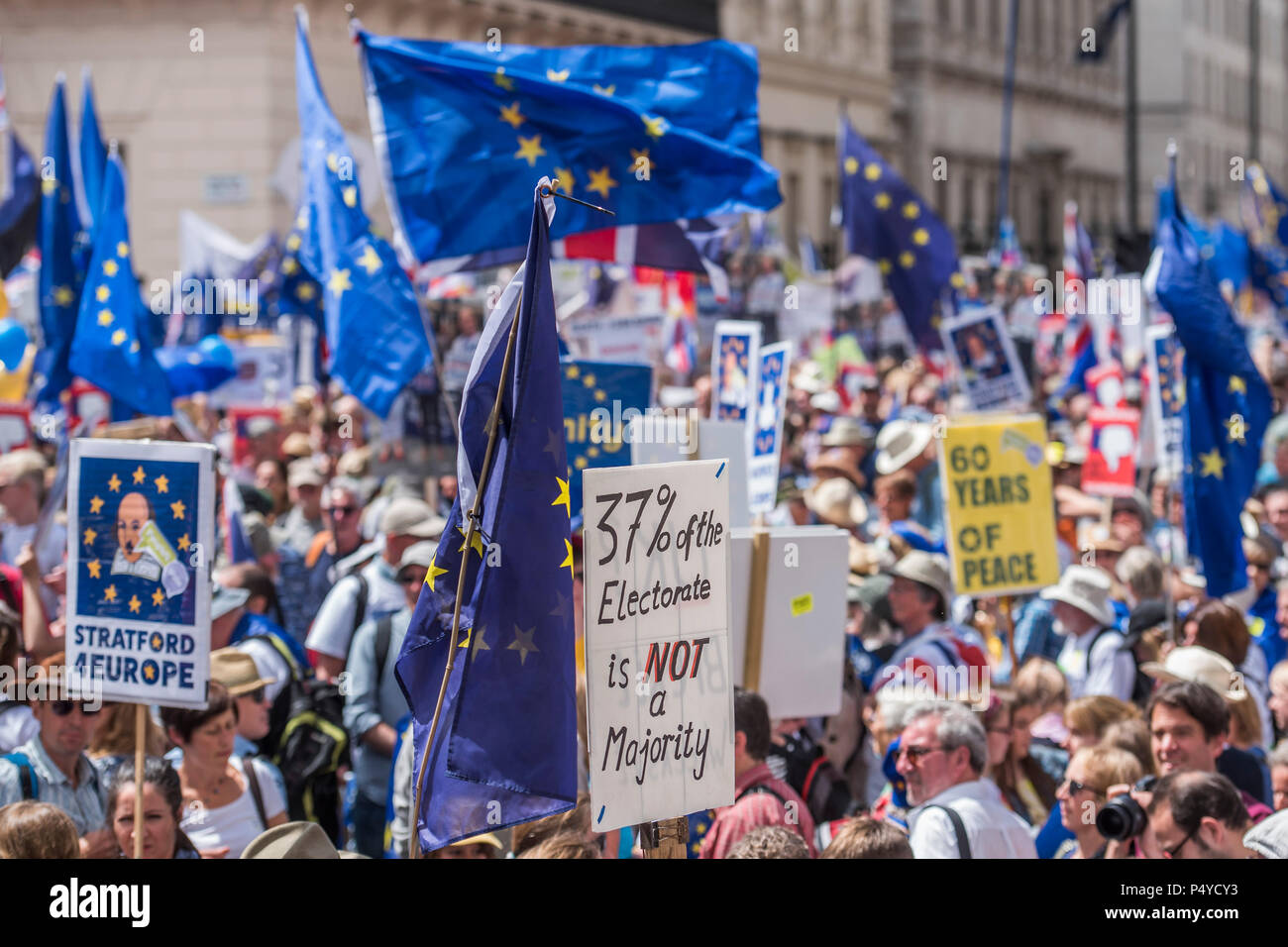 London, UK. 23rd June 2018. Gathering on Pall Mall in front of the Crimea War Memorial and the IOD - People’s March for a People’s Vote on the final Brexit deal.  Timed to coincide with the second anniversary of the 2016 referendum it is organised by anti Brexit, pro EU campaigners. Credit: Guy Bell/Alamy Live News Stock Photo
