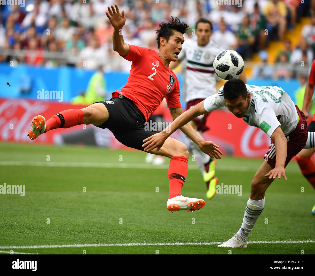 Rostov On Don. 23rd June, 2018. Lee Yong (L) of South Korea vies with Hirving Lozano of Mexico during the 2018 FIFA World Cup Group F match between South Korea and Mexico in Rostov-on-Don, Russia, June 23, 2018. Credit: Li Ga/Xinhua/Alamy Live News Stock Photo