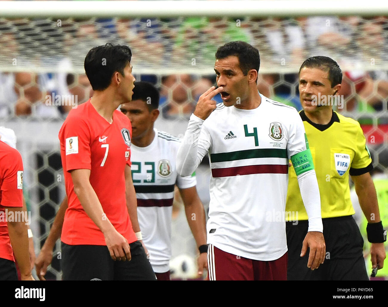 Rostov On Don. 23rd June, 2018. Rafael Marquez (2nd R) of Mexico talks with Son Heungmin of South Korea during the 2018 FIFA World Cup Group F match between South Korea and Mexico in Rostov-on-Don, Russia, June 23, 2018. Credit: Li Ga/Xinhua/Alamy Live News Stock Photo