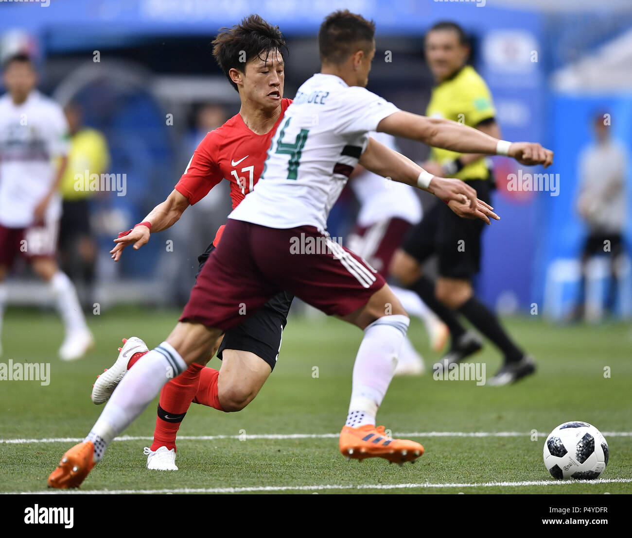 Rostov On Don. 23rd June, 2018. Lee Jaesung (L) of South Korea vies with Javier Hernandez of Mexico during the 2018 FIFA World Cup Group F match between South Korea and Mexico in Rostov-on-Don, Russia, June 23, 2018. Credit: Chen Yichen/Xinhua/Alamy Live News Stock Photo