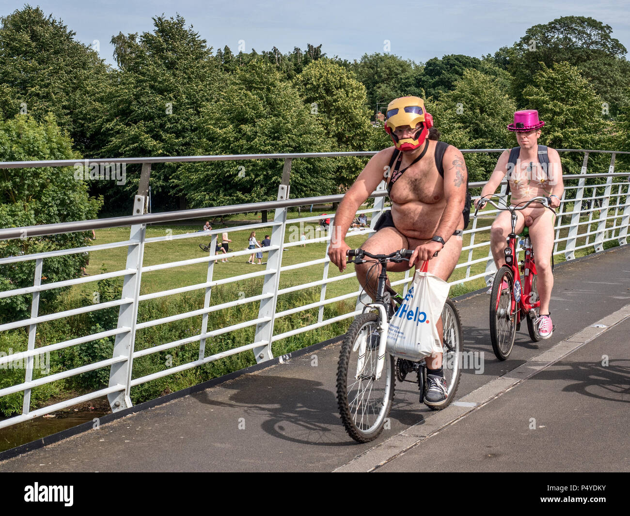 York, UK. 23rd June 2018. The thirteenth York World Naked Bike Ride leaving Millennium Bridge, a body positive event celebrating the bodies of cyclists, demonstrating vulnerability and requesting motorists see cyclists when they're not naked. Credit: Mark Sunderland/Alamy Live News Stock Photo