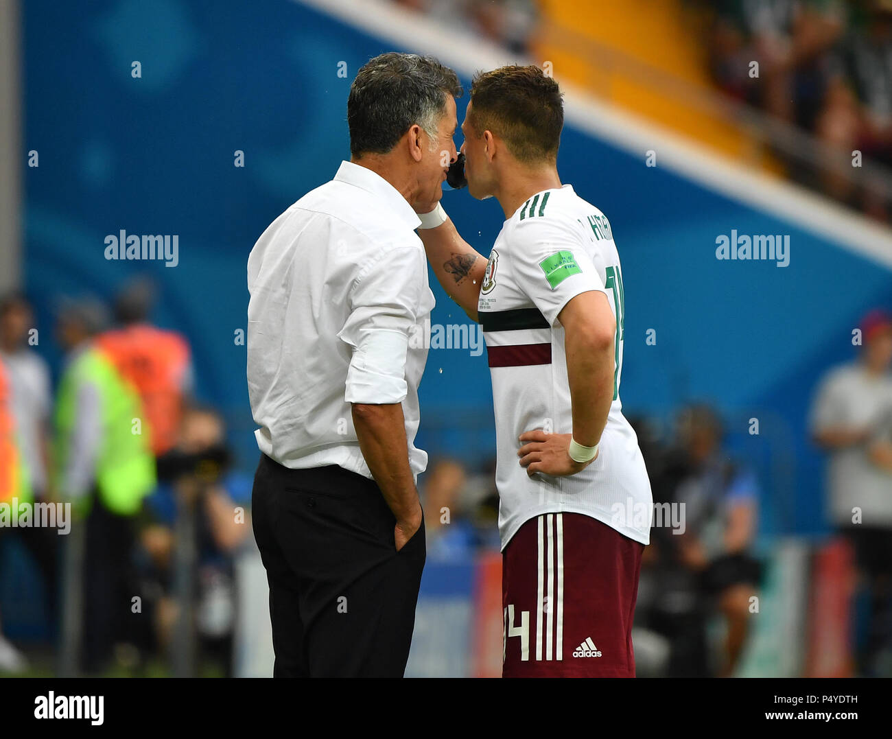 Rostov On Don. 23rd June, 2018. Mexico's head coach Juan Carlos Osorio (L) talks with Javier Hernandez during the 2018 FIFA World Cup Group F match between South Korea and Mexico in Rostov-on-Don, Russia, June 23, 2018. Credit: Li Ga/Xinhua/Alamy Live News Stock Photo