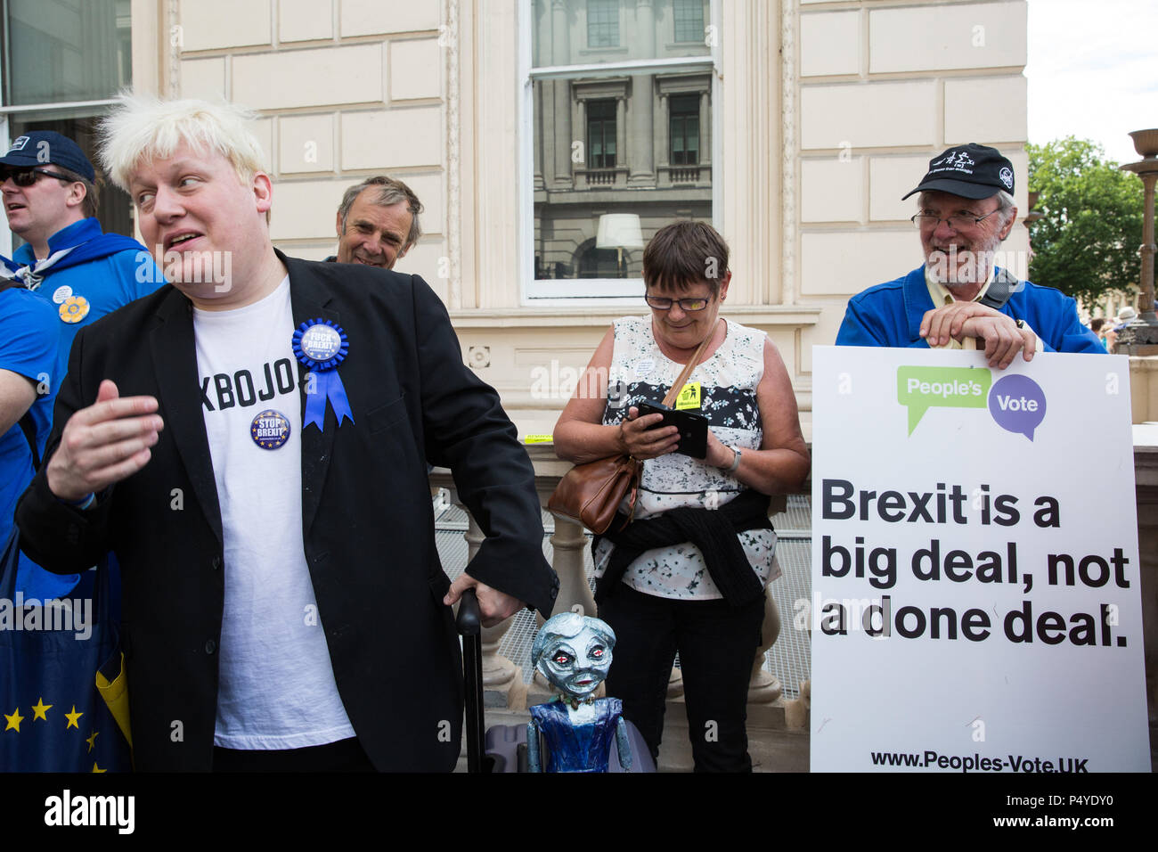 London, UK. 23rd June 2018. Boris Johnson lookalike Faux Bojo joins tens of thousands of people representing a coalition of pro-EU groups marching on the second anniversary of the referendum vote to call for a ‘People’s Vote’ on any Brexit deal proposed by the Government to manage its future relationship with the European Union. Credit: Mark Kerrison/Alamy Live News Stock Photo