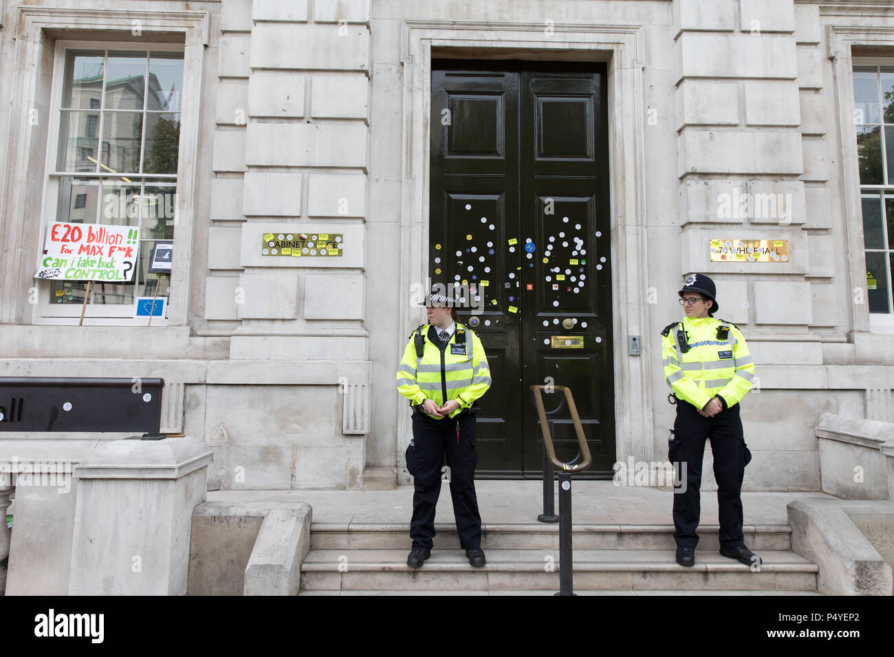 Westminster, London, UK. 23rd June 2018. Anti Brexit stickers and banners at the Cabinet Office. The March for a People's Vote on the terms of the final Brexit deal took place today. Credit: Carol Moir/Alamy Live News Stock Photo