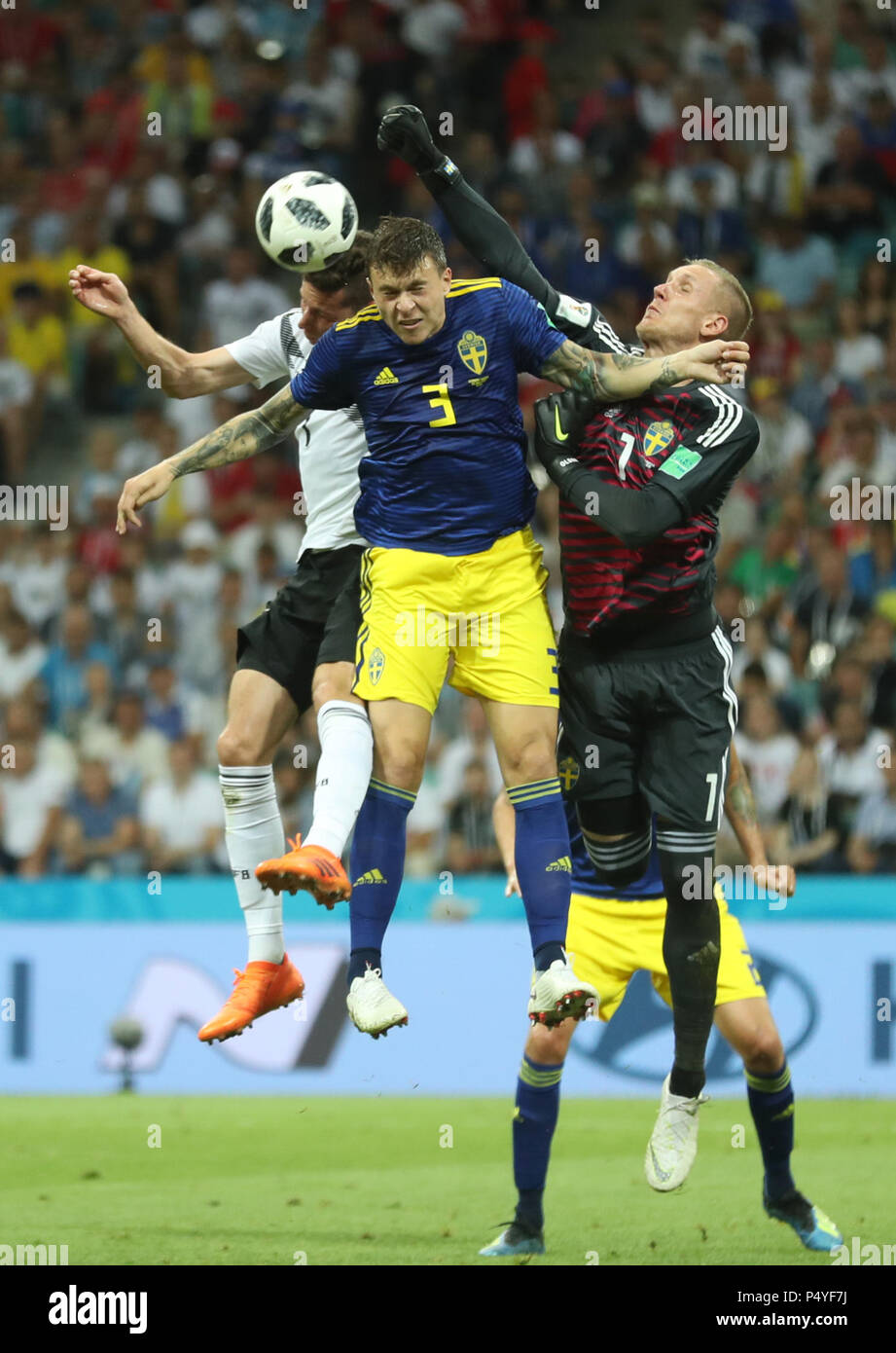 Sochi, Russia. 23rd June, 2018. Victor Lindelof (C) and goalkeeper Robin Olsen of Sweden defend during the 2018 FIFA World Cup Group F match between Germany and Sweden in Sochi, Russia, June 23, 2018. Credit: Ye Pingfan/Xinhua/Alamy Live News Stock Photo