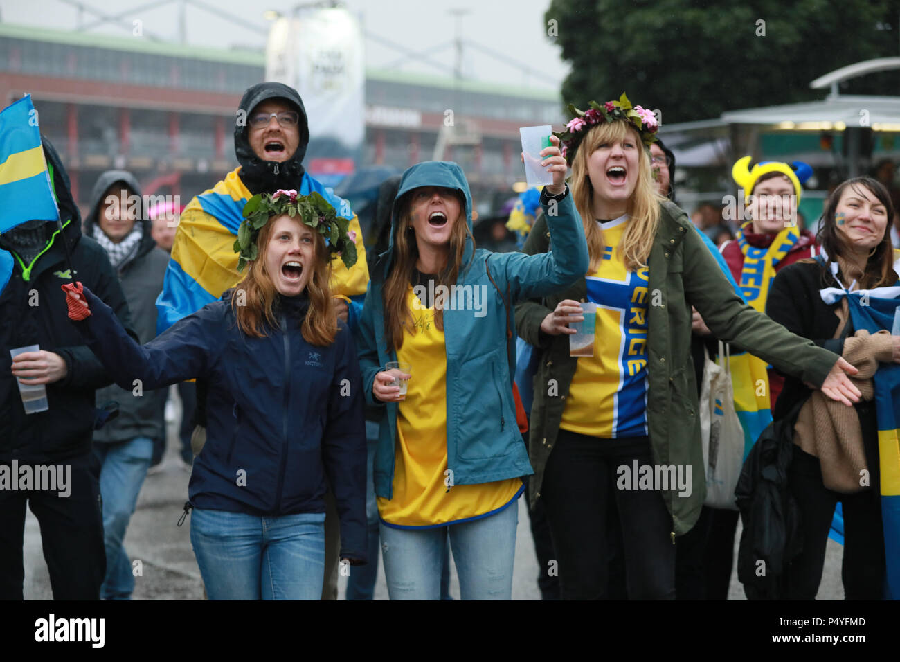 Hamburg, Germany. 23rd June 2018. World Cup, Soccer, Germany vs Sweden, Group Stage, Group F, 2nd match day: Swedish fans Anna, Andrea and Annsofi cheer on their team. Photo: Paul Weidenbaum/dpa Credit: dpa picture alliance/Alamy Live News Stock Photo