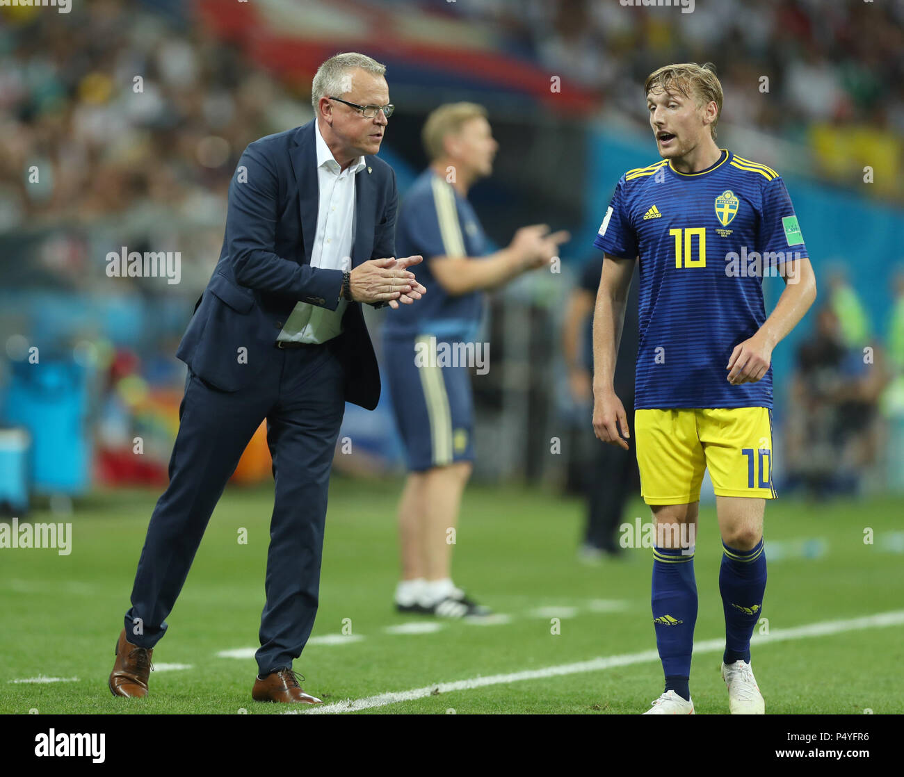 Sochi, Russia. 23rd June, 2018. Head coach Janne Andersson (L) of Sweden gives instructions to Emil Forsberg during the 2018 FIFA World Cup Group F match between Germany and Sweden in Sochi, Russia, June 23, 2018. Credit: Fei Maohua/Xinhua/Alamy Live News Stock Photo