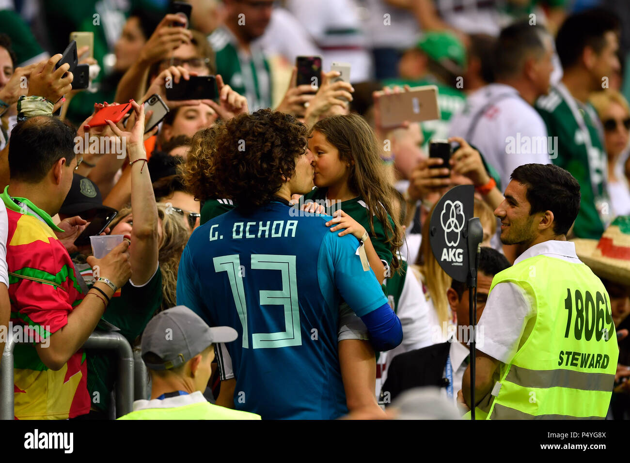 Rostov-on-Don, Russia. 23rd June, 2018. Soccer, FIFA World Cup 2018, South Korea vs Mexico, group stages, Group F, 2nd matchday at the Rostov-on-Don Stadium: Goalkeeper of Mexico Guillermo Ochoa kisses a child after the match. Credit: Marius Becker/dpa/Alamy Live News Stock Photo
